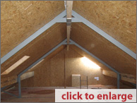 Erect gables, ridge beams, purlins, trusses (where required), fit roof panels.